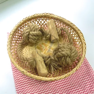 Rope-ball and coffee wood combinations displayed in a sample basket
